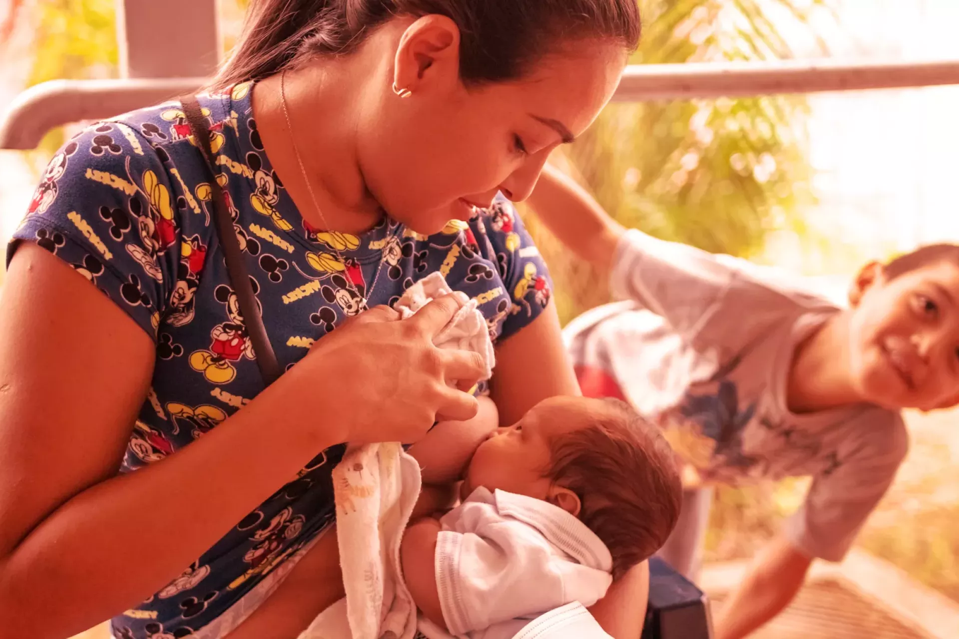 A mother breastfeeding her baby