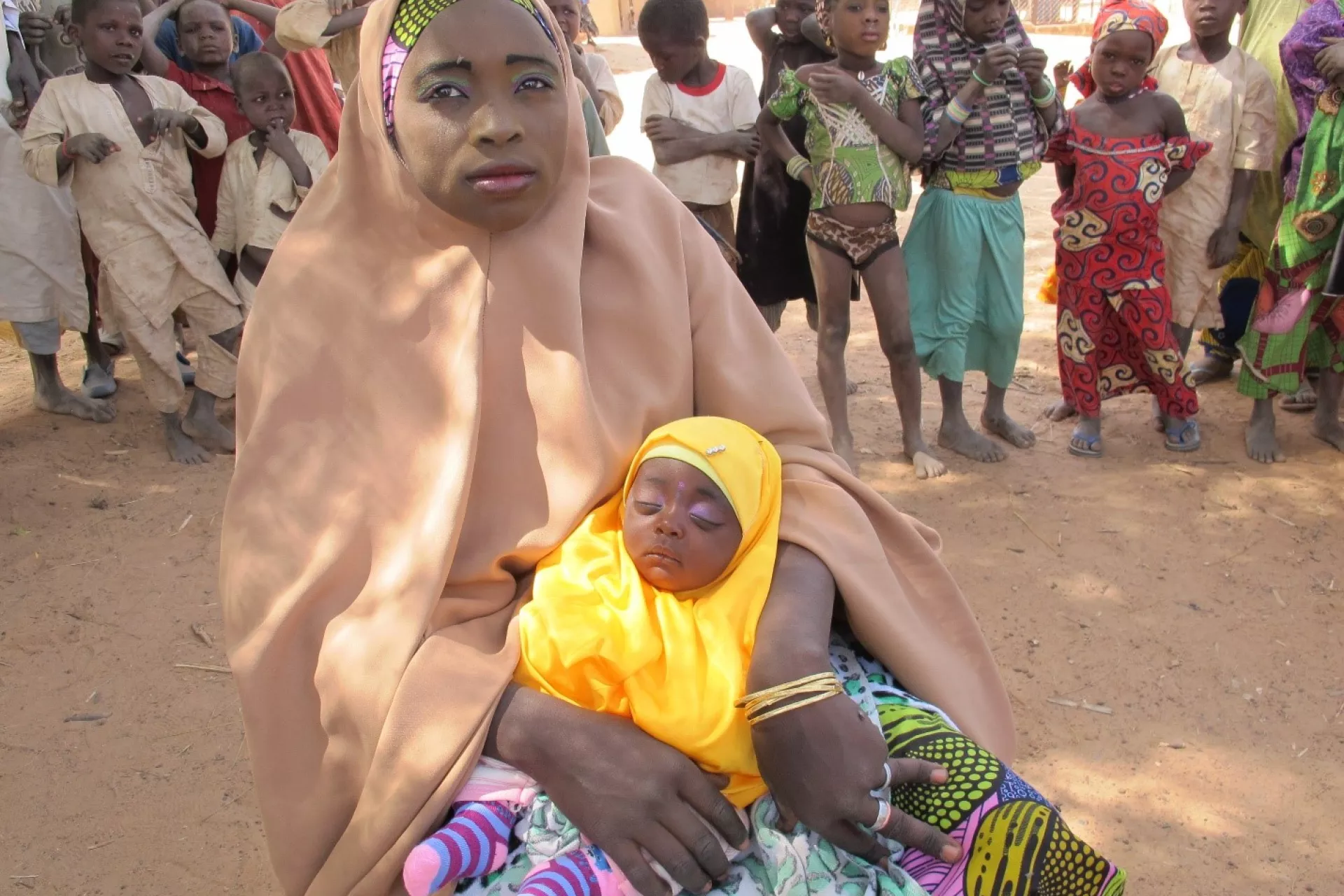 Masa&rsquo;uda Abdullahi holds her daughter Rahama in Kebbi State, north-western Nigeria.