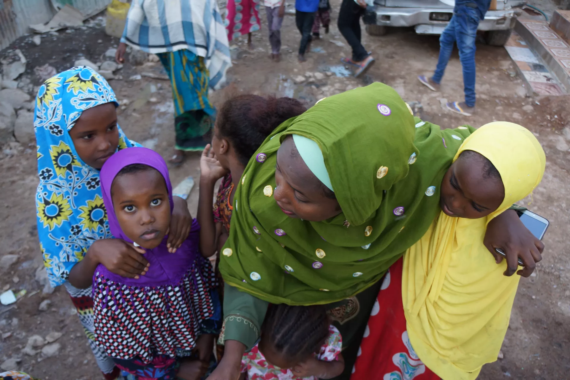 A woman gathers with children, Djibouti