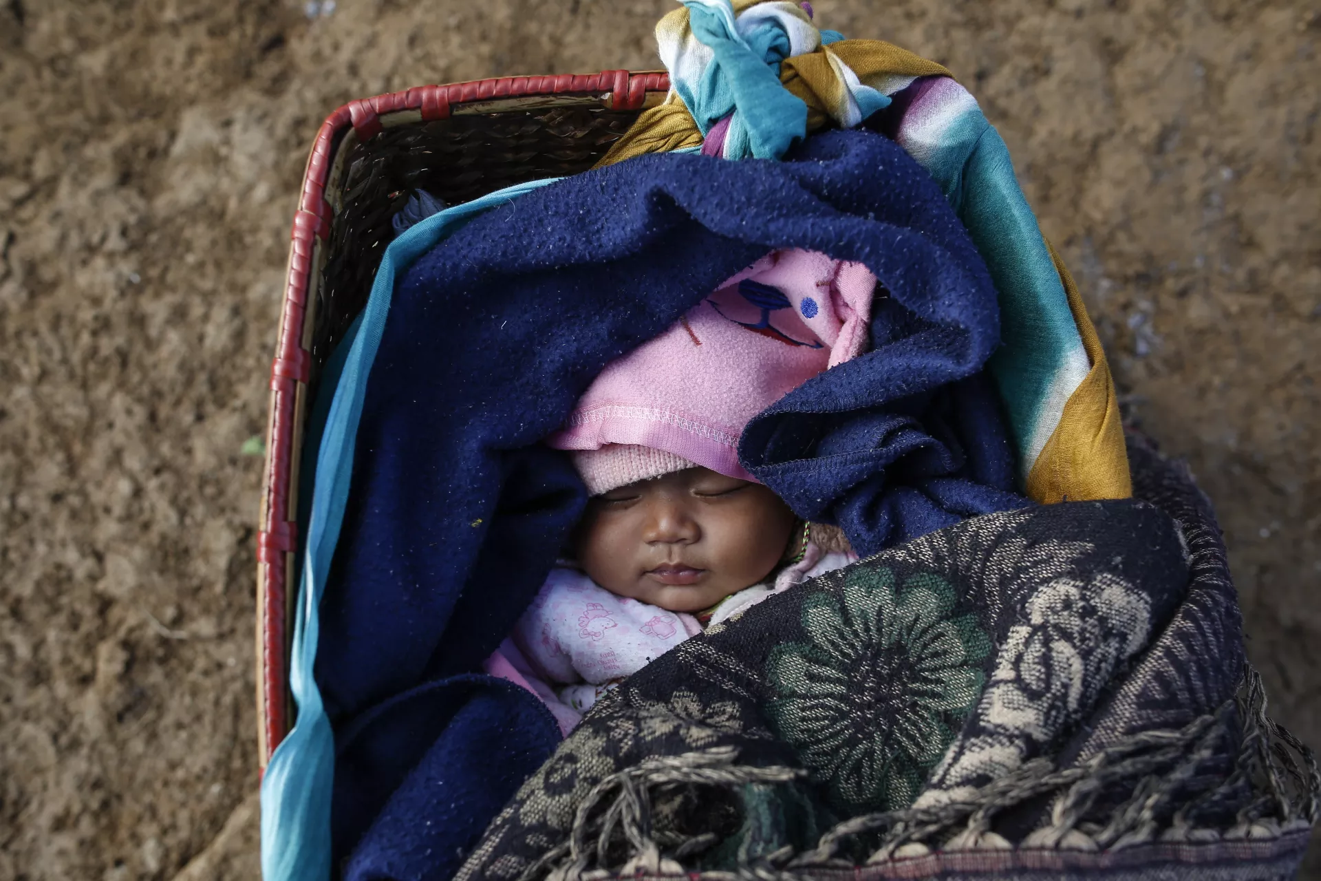 A four-month-old baby boy with his Nepalese mother, who lost her home during the April 2015 earthquake, have been living in Earthquake Camp in Gupsipakha, Nepal.