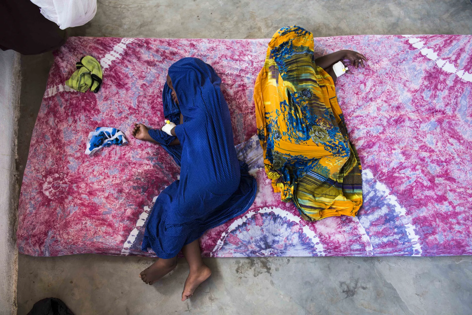 Two young measles patients at Kismayo General Hospital in Kismayo, Somalia.