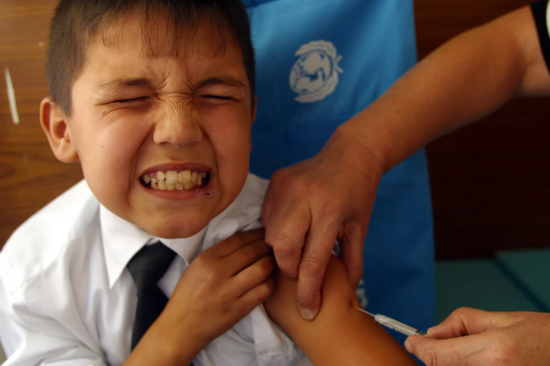10-year-old boy is vaccinated during a national immunization campaign in Dushanbe, Tajikistan.