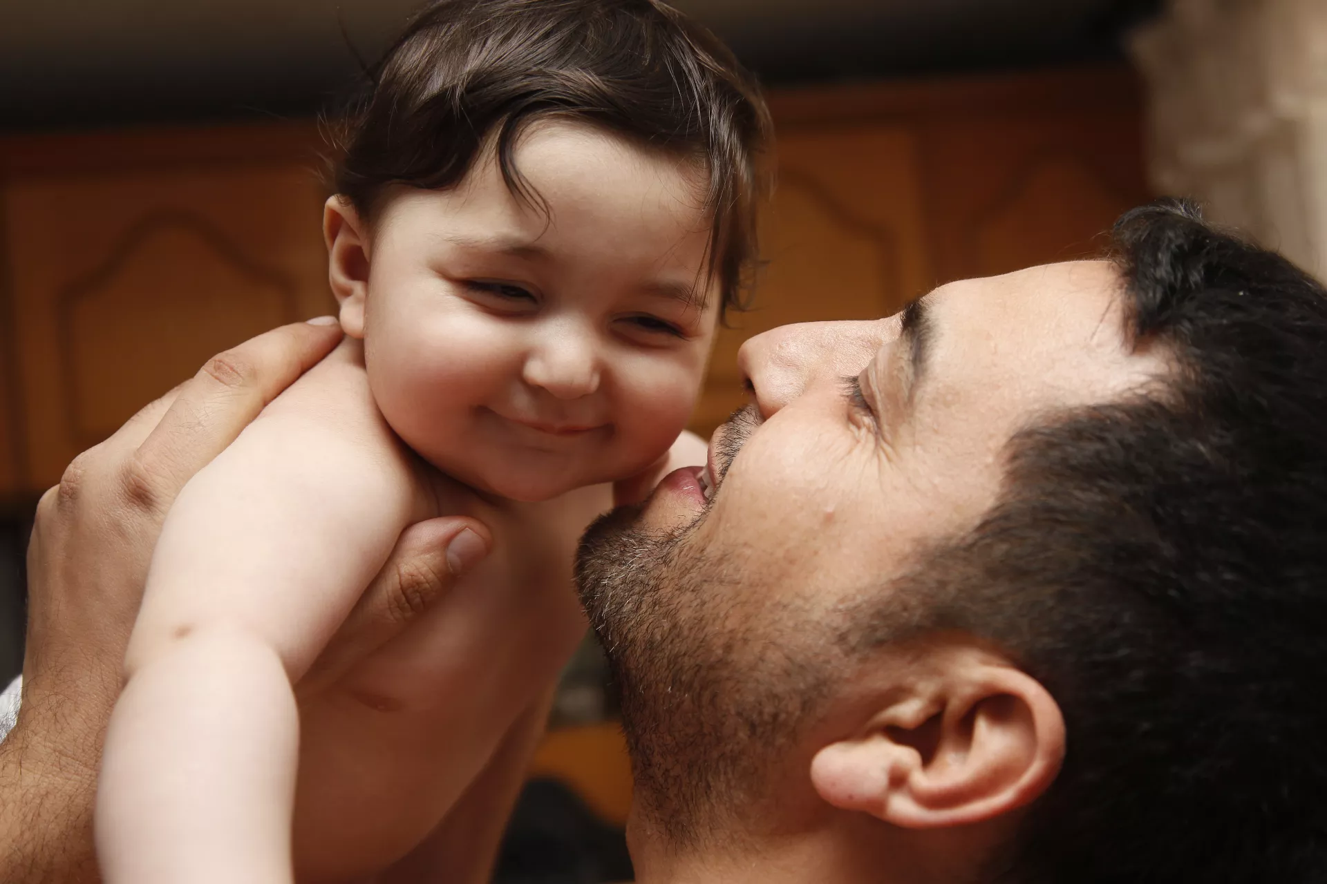 Early childhood development: A father holds his daughter in North Macedonia