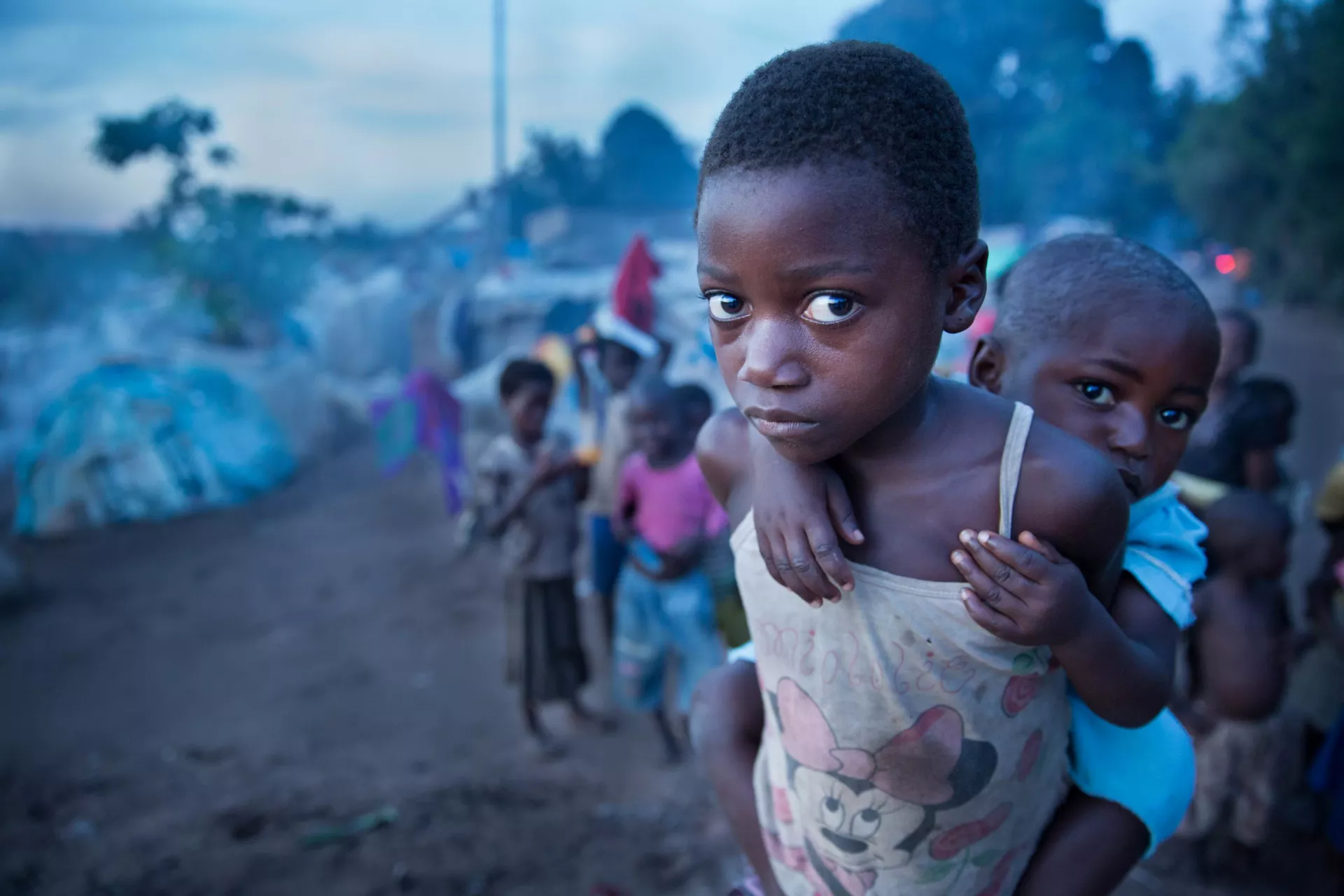 A displaced young girl and her sister in the Democratic Republic of the Congo 