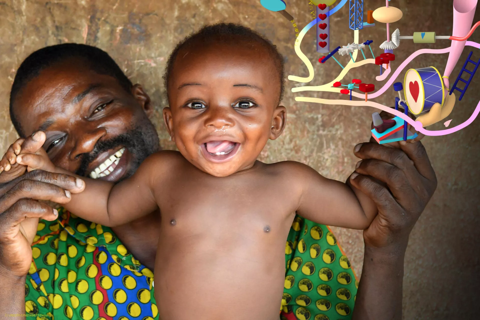 A father playing with his baby.