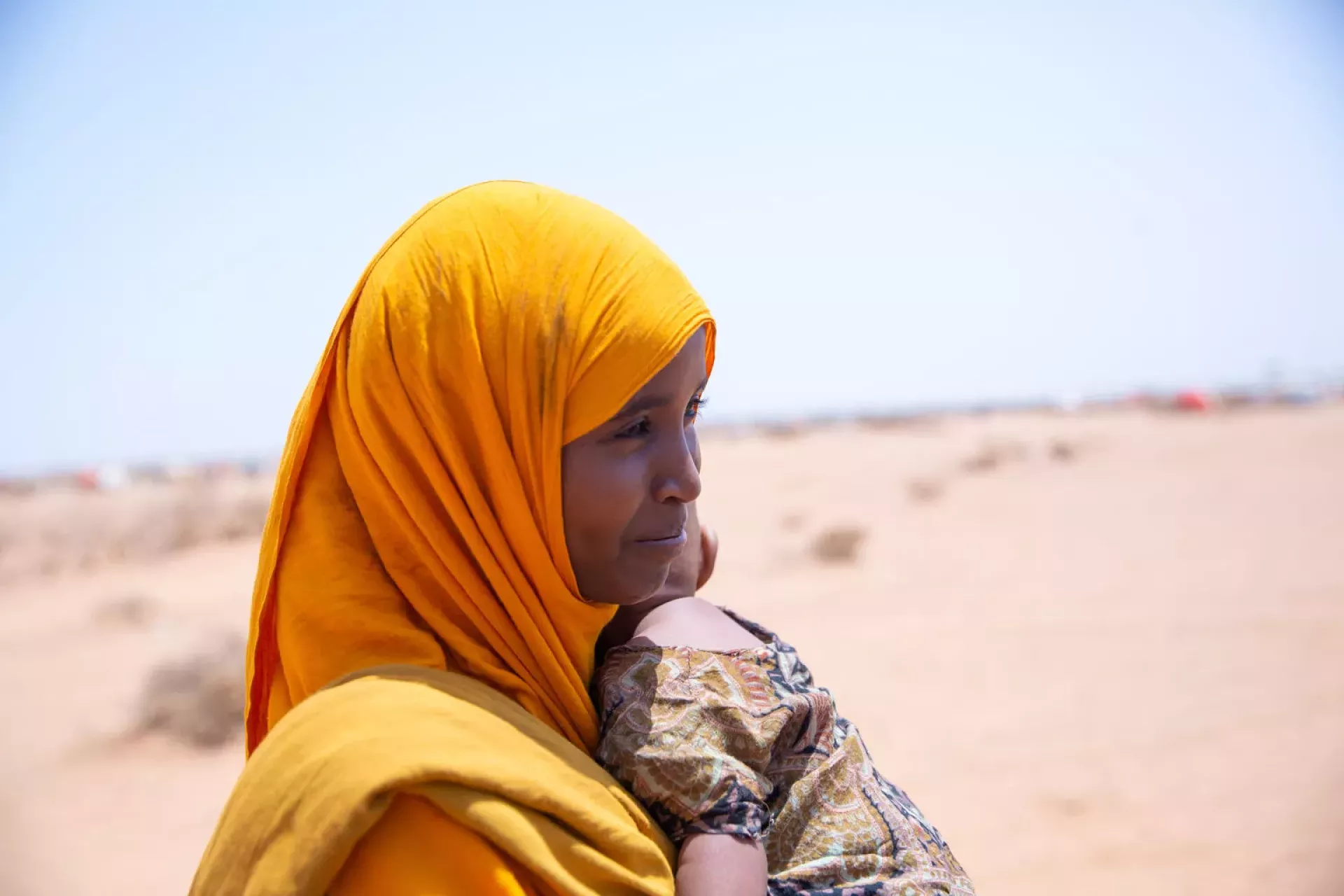 woman holding baby