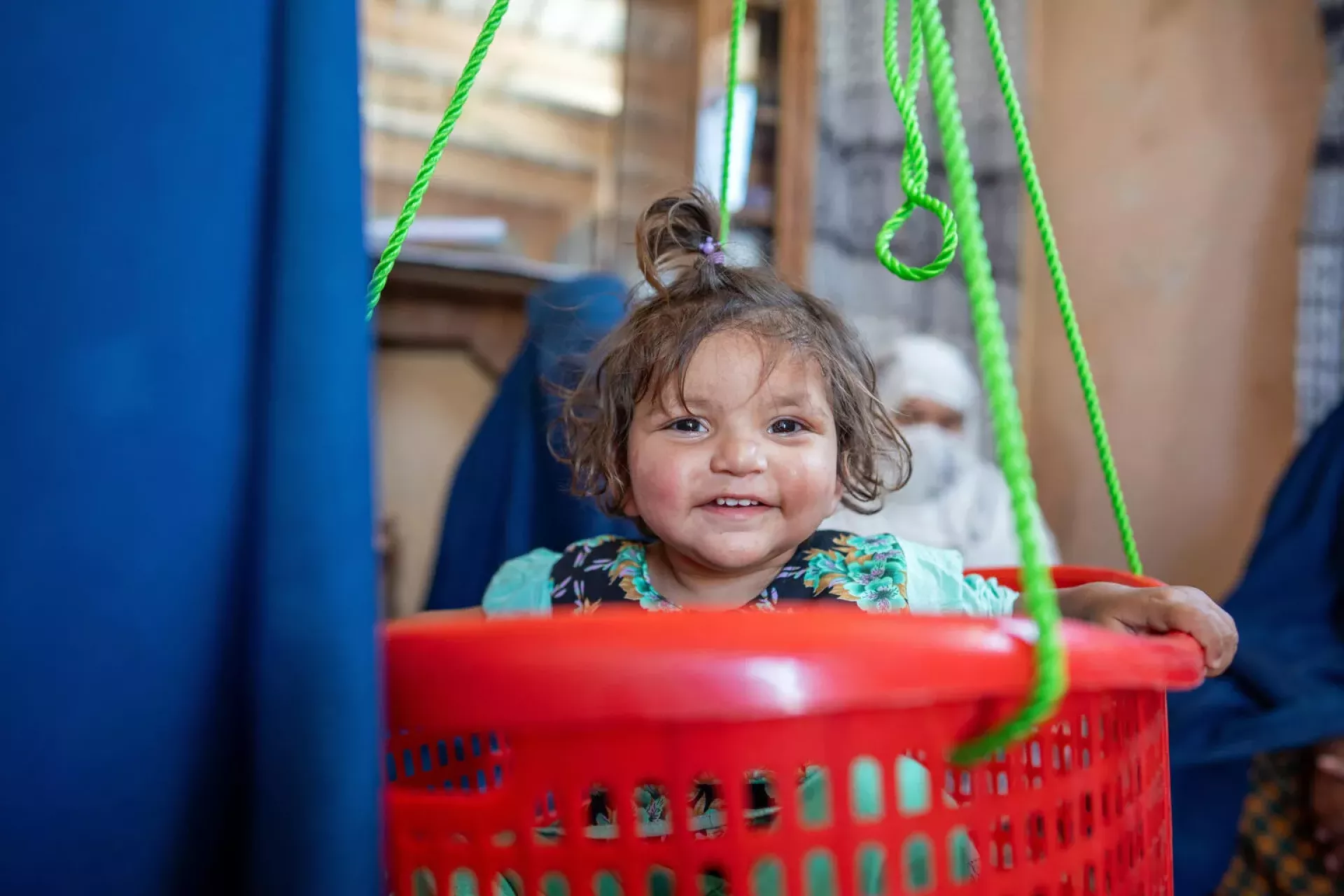 Afghanistan. &nbsp;A girl is weighed at a UNICEF-supported health post in Nangarhar Province, eastern Afghanistan.