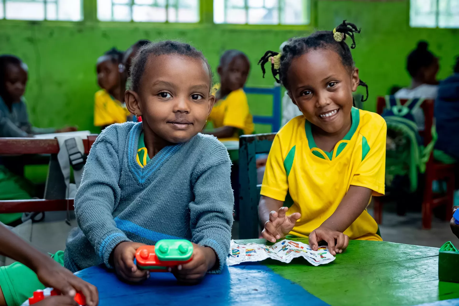 Children learning how to build a toy car during play time at an early childhood development center in Rubavu district, Rwanda. December 2024.