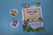 Mykyta is given some stickers and a certificate for being a &ldquo;brave patient&rdquo;.