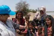 Pakistan. Zahida, chief of UNICEF&rsquo;s Hyderabad field office, talks with children in Shaheed Benazirabad District, Nawabshah, Sindh Province.