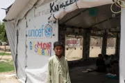 Pakistan. Muhammad Hasnain, 9, stands outside a UNICEF temporary learning centre in Rajanpur District, Punjab.