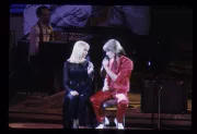 Olivia Newton-John and Andy Gibb performing together.