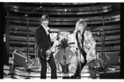 Kris Kristofferson and Rod Stewart performing together.