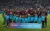 Barcelona football players with children