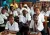 School children sitting at their desks in a classroom.