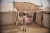 Sudan. A boy stands outside tents at a gathering site in Port Sudan.
