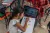 Girl on laptop and drawing