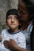 Peru. Hansel is hugged by his mother, Nayci, at their home in Ayacucho.
