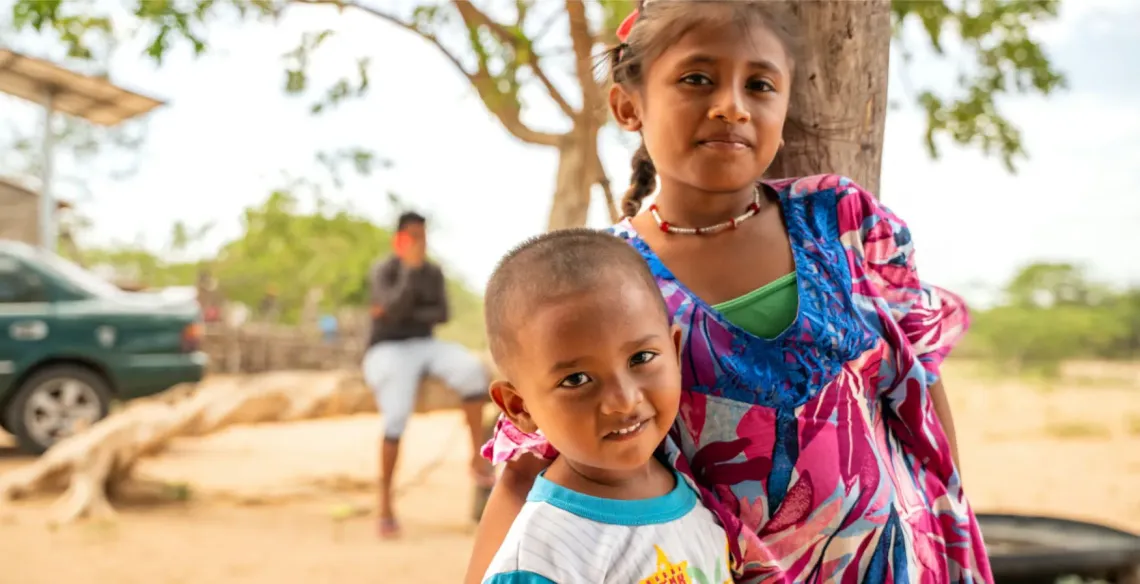Two children smiling