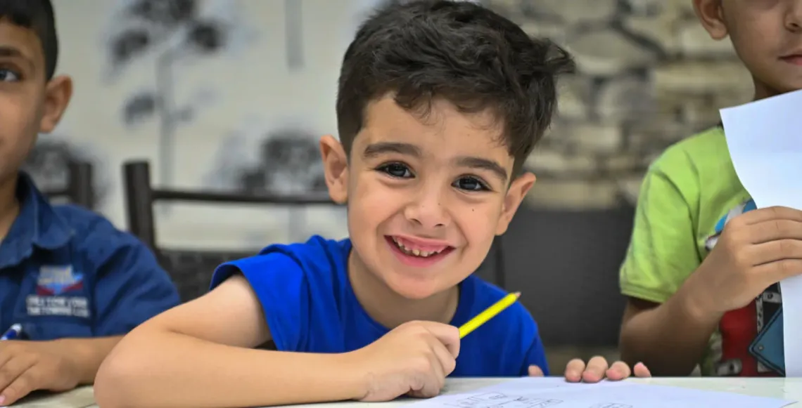 A boy smiling