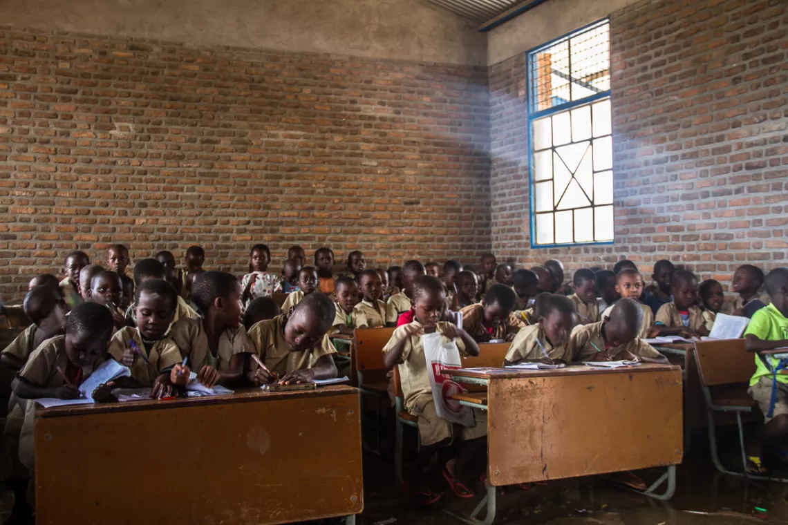 Aimable at class in his primary schoo