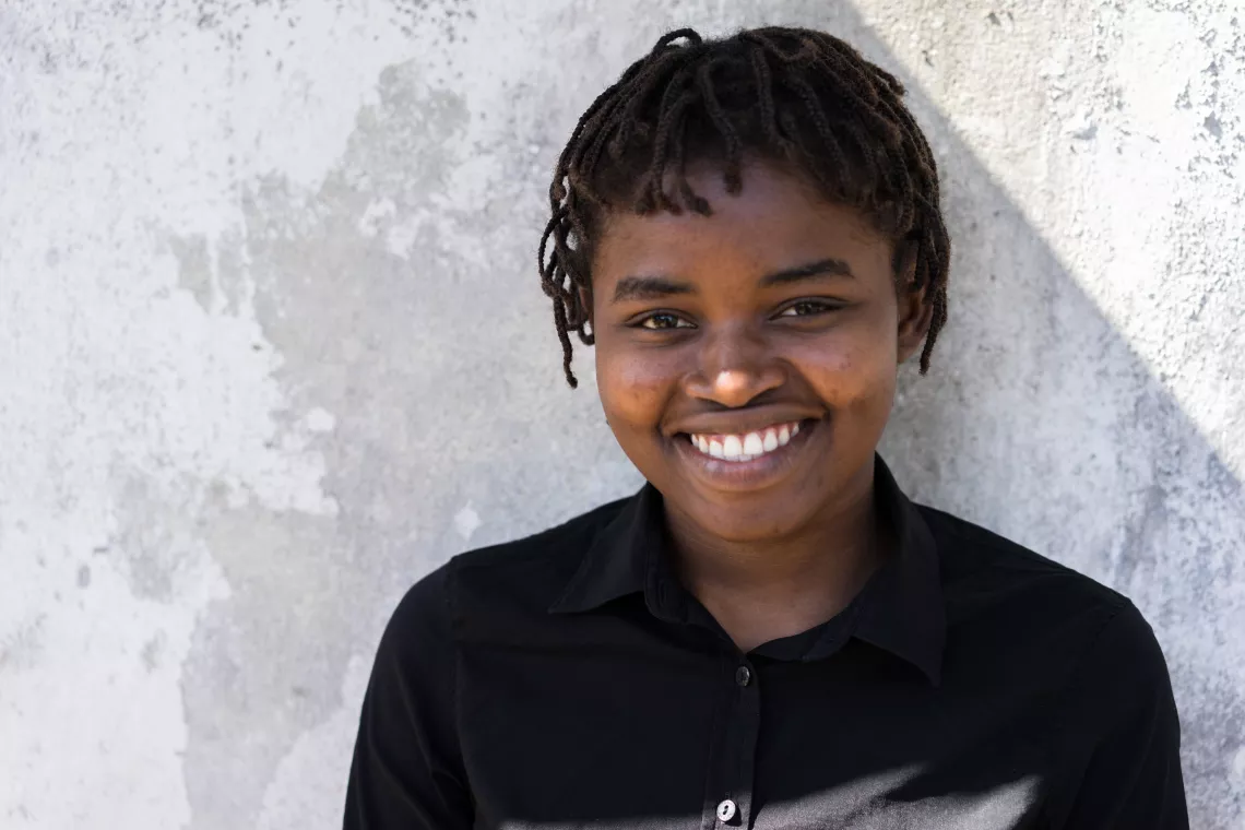 A teenage girl smiles, Mozambique