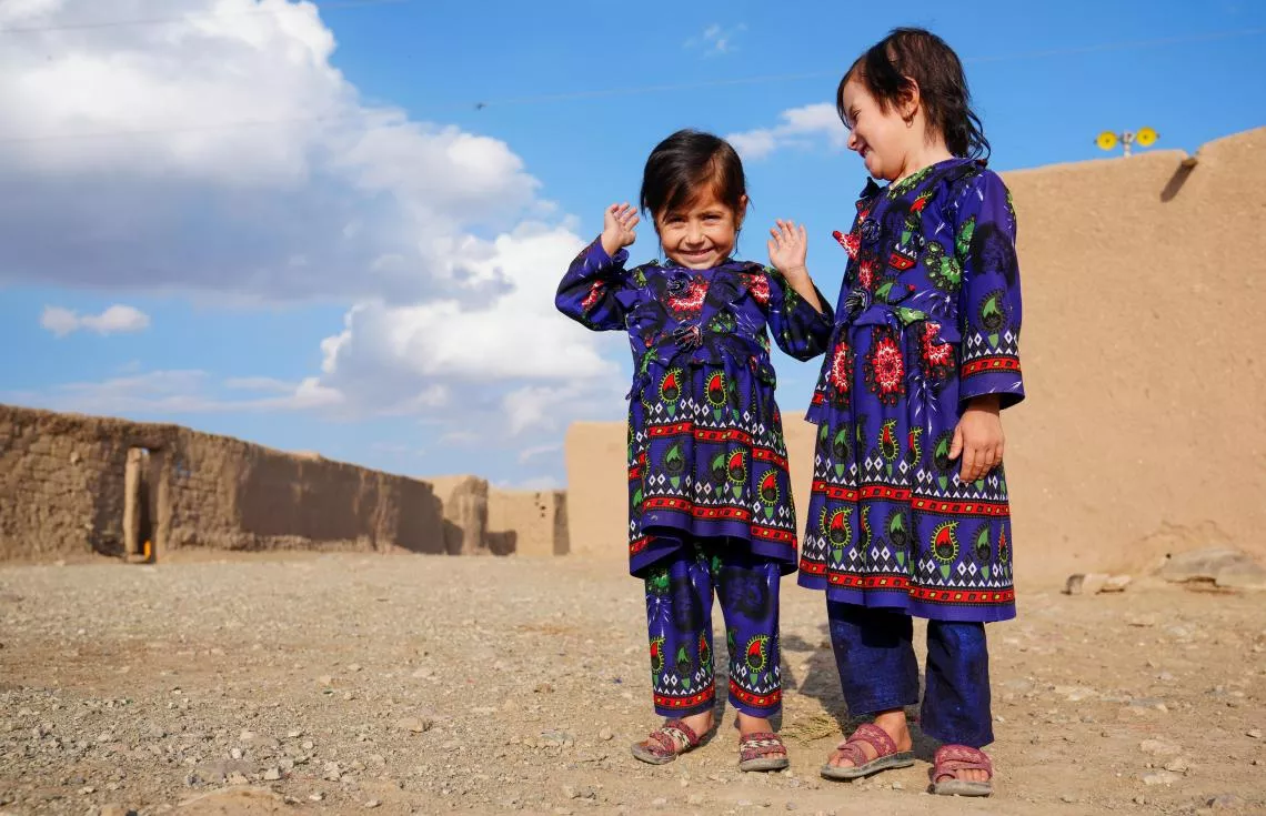 Parwana smiles with her sister, Afsana.