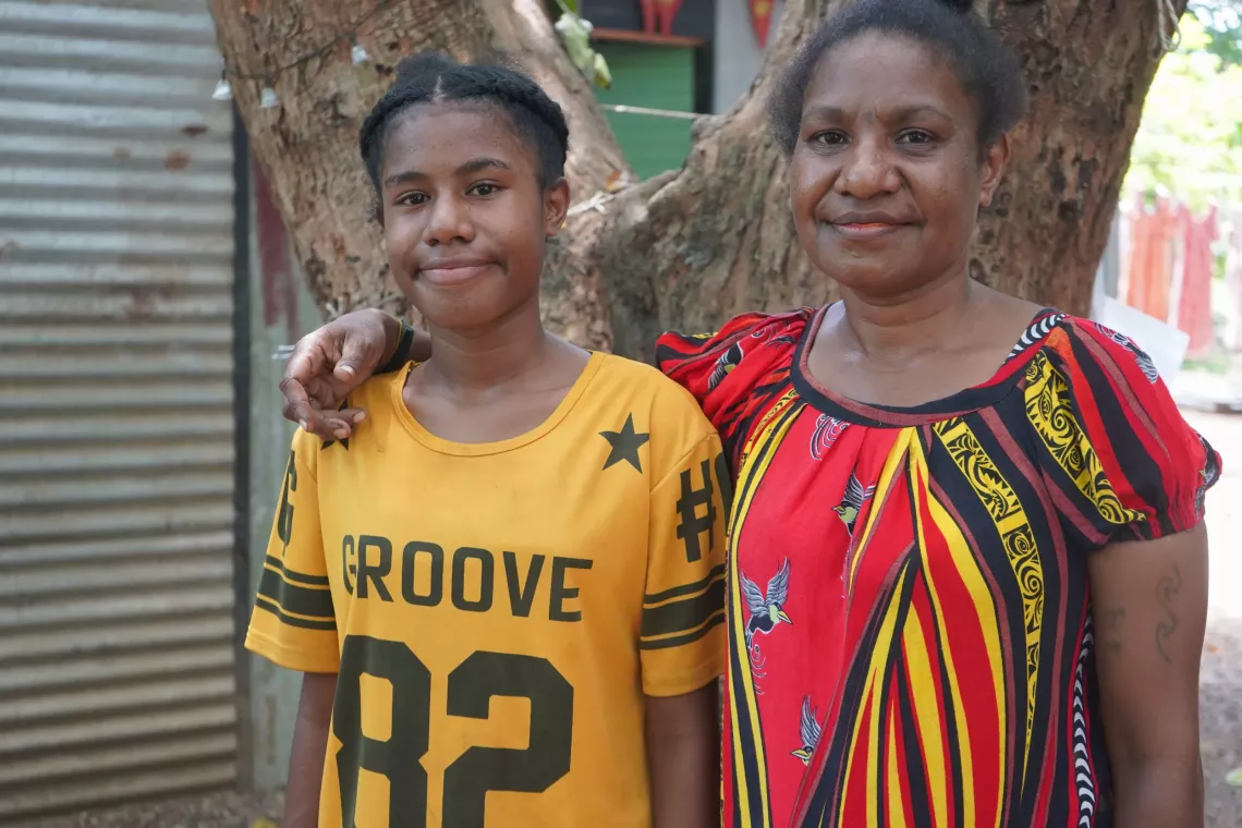 Papua New Guinea: Jovensha,15 with her mother, Barbie in Port Moresby.