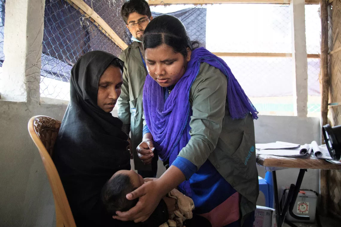 A child receives a vaccine, Bangladesh