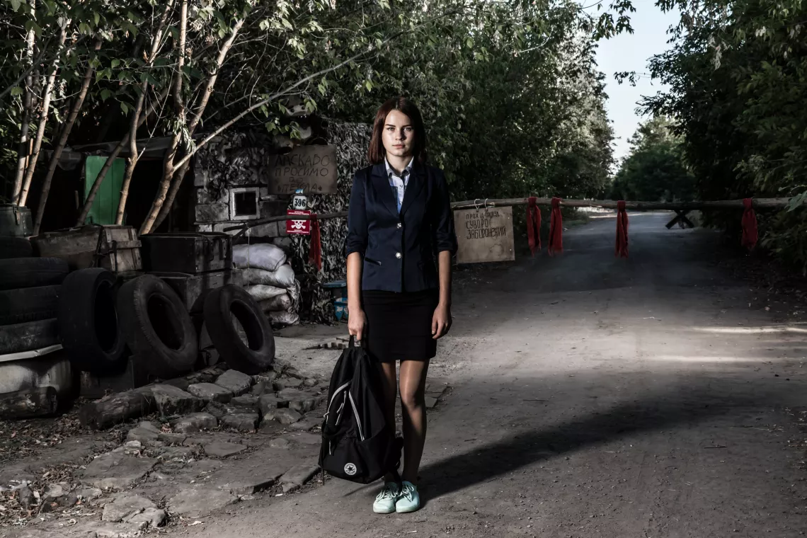Diana Fedorchenko, 14, at the last government checkpoint in Bakhmutka, Donetsk region.