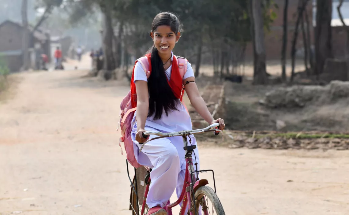 Kiran Bauri riding a bike