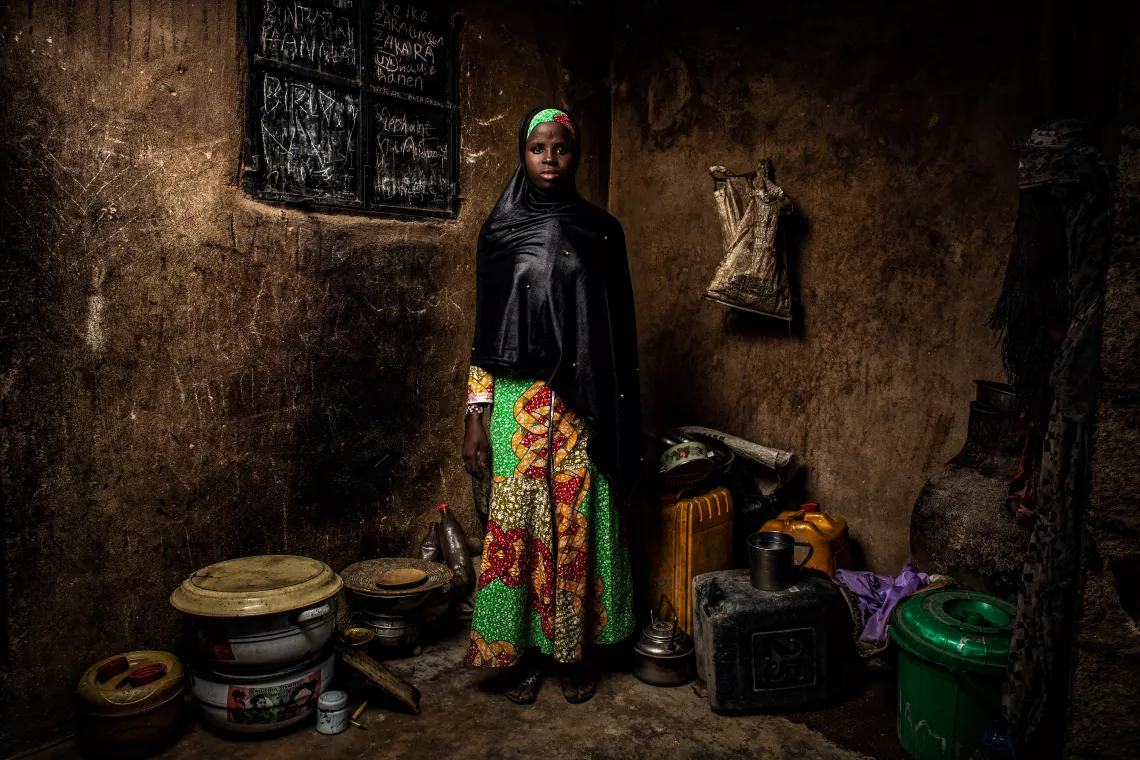 Bintu Mohammed, 13, stands in her home in Banki, in northeast Nigeria. 