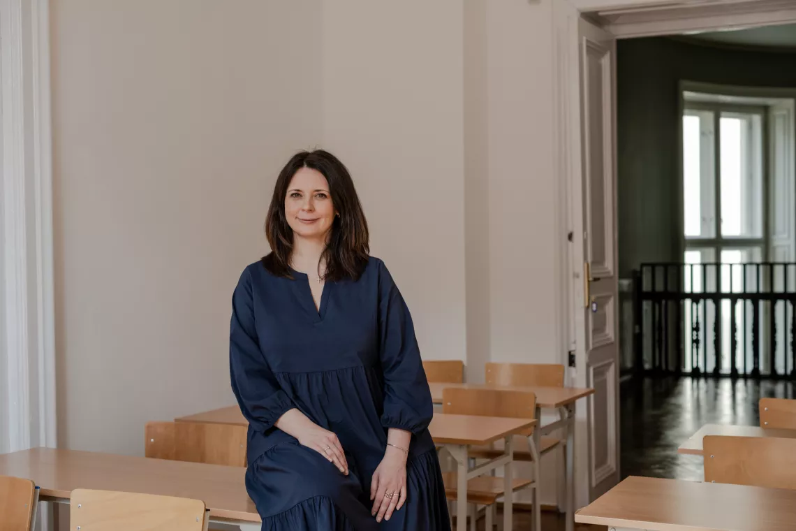 Viktoriia Gnap sits in the school that her organization, Unbreakable Ukraine, runs. 