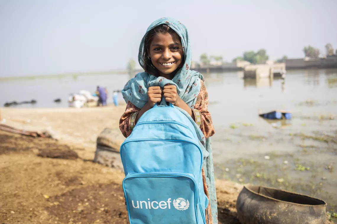 In Jacobabad, Sindh province, Pakistan, 8-year-old Ameer Zadi goes to school for the first time since UNICEF established a temporary learning centre in her area, which was one of the worst hit by recent flooding.