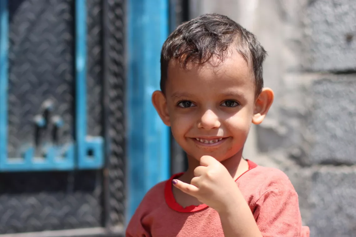 As part of UNICEF's polio campaigns in Yemen, a child is happy after receiving the polio vaccine.