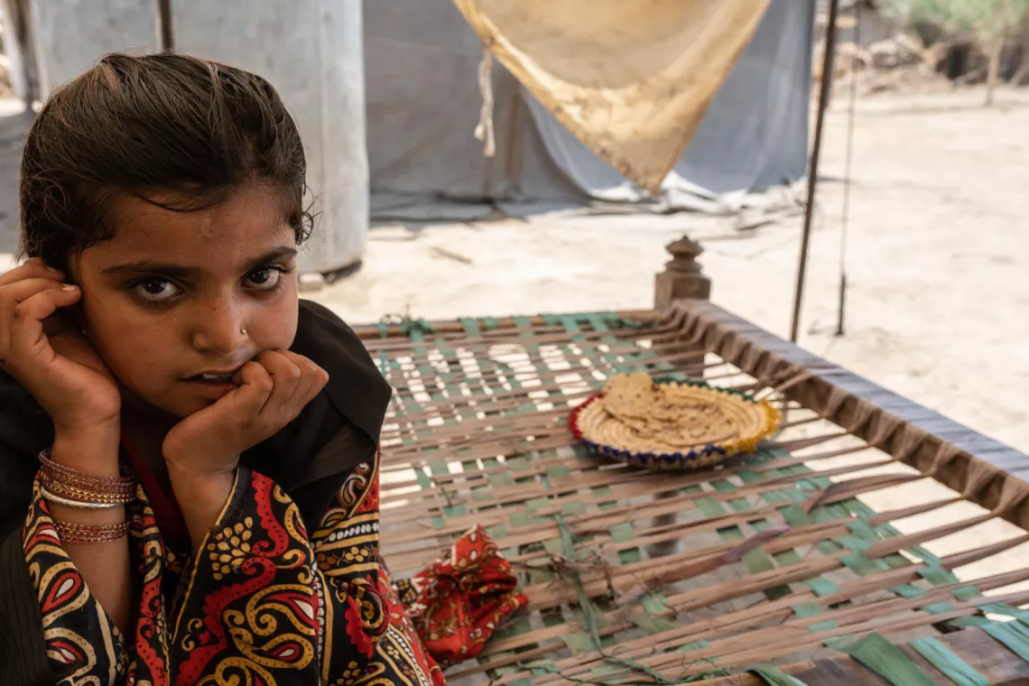 Pakistan. Uzma, 8, sits at her home in Shaheed Benazirabad District in Sindh Province.