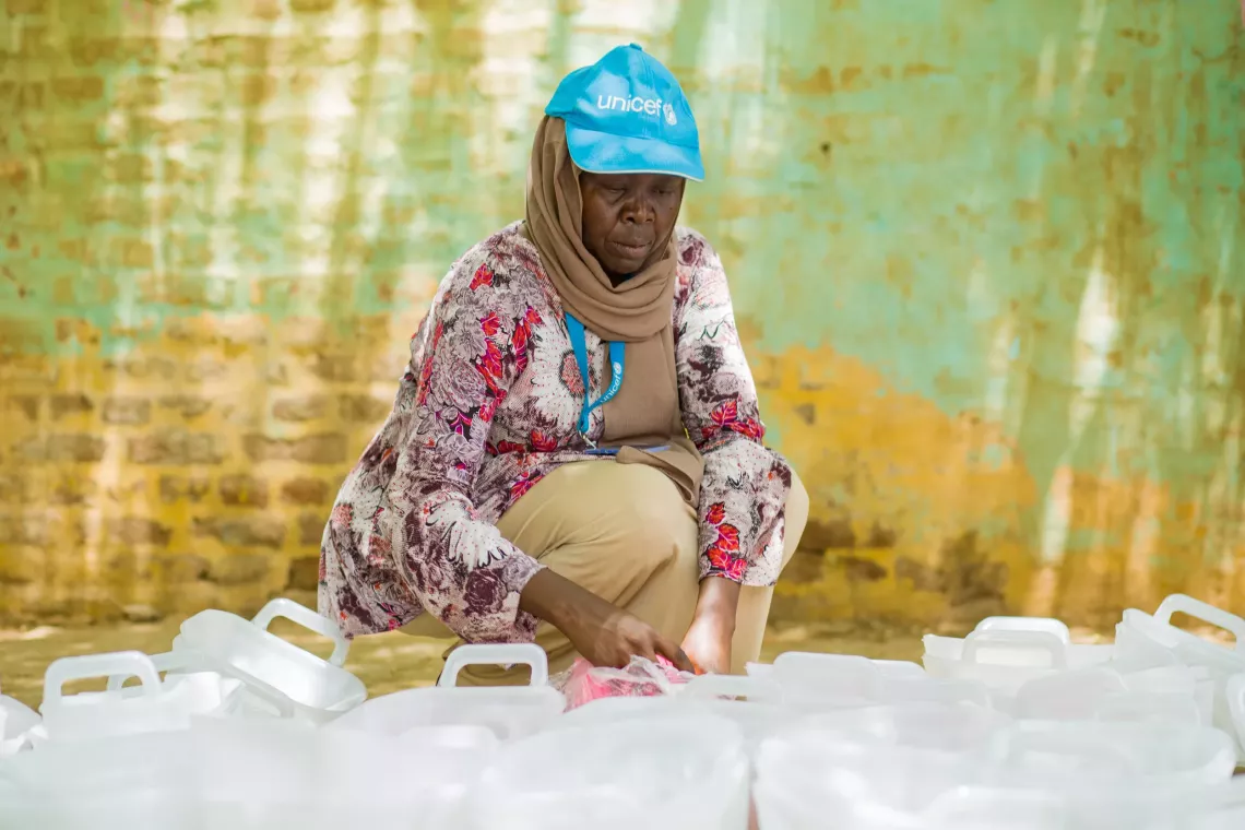 Distribution of WASH supplies in Madani 