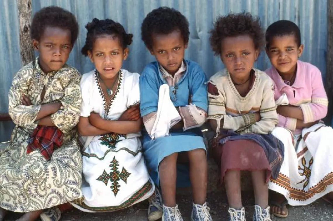 Students wait outside their elementary school in Addis Ababa. Ethiopia, 1986.