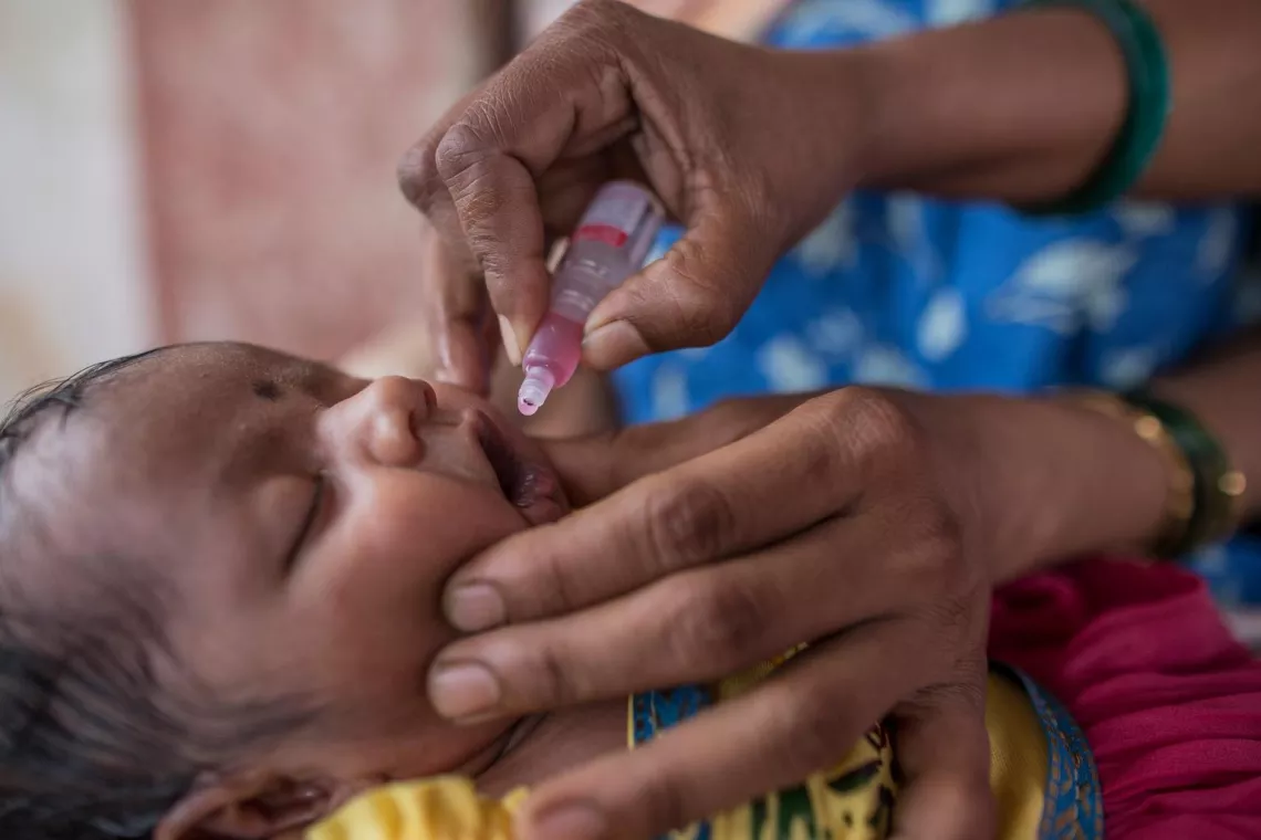  A newborn child is vaccinated. 