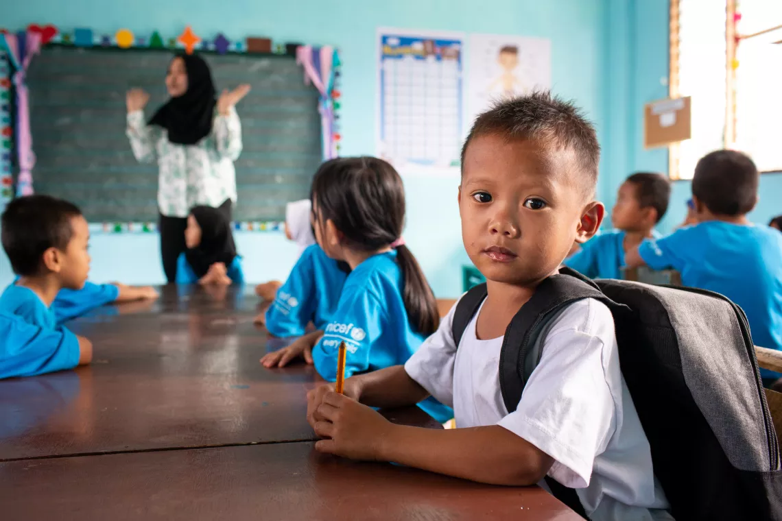 Philippines. A boy sits in a classroom.