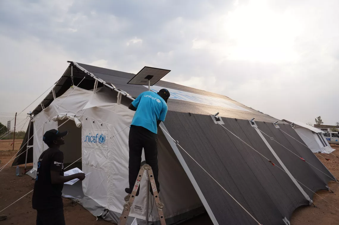 Uganda. A prototype of a High Performance Tent is assembled for testing in hot and dry weather conditions.