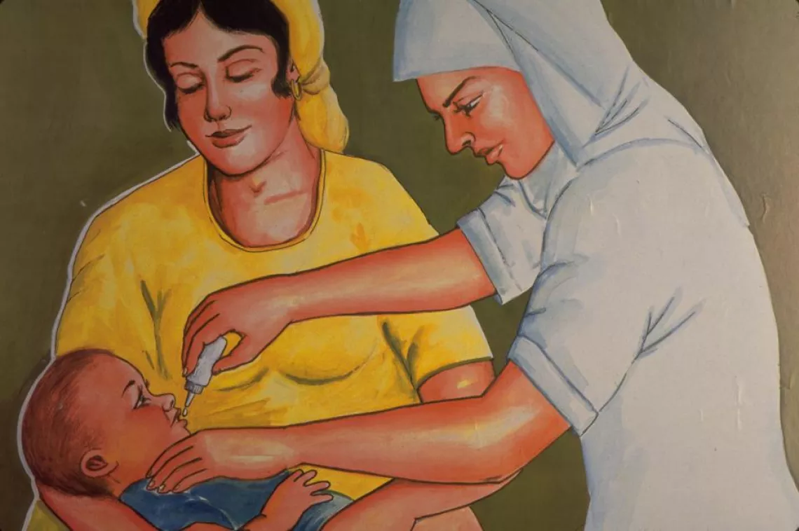 A poster shows a baby held by his mother while being vaccinated.