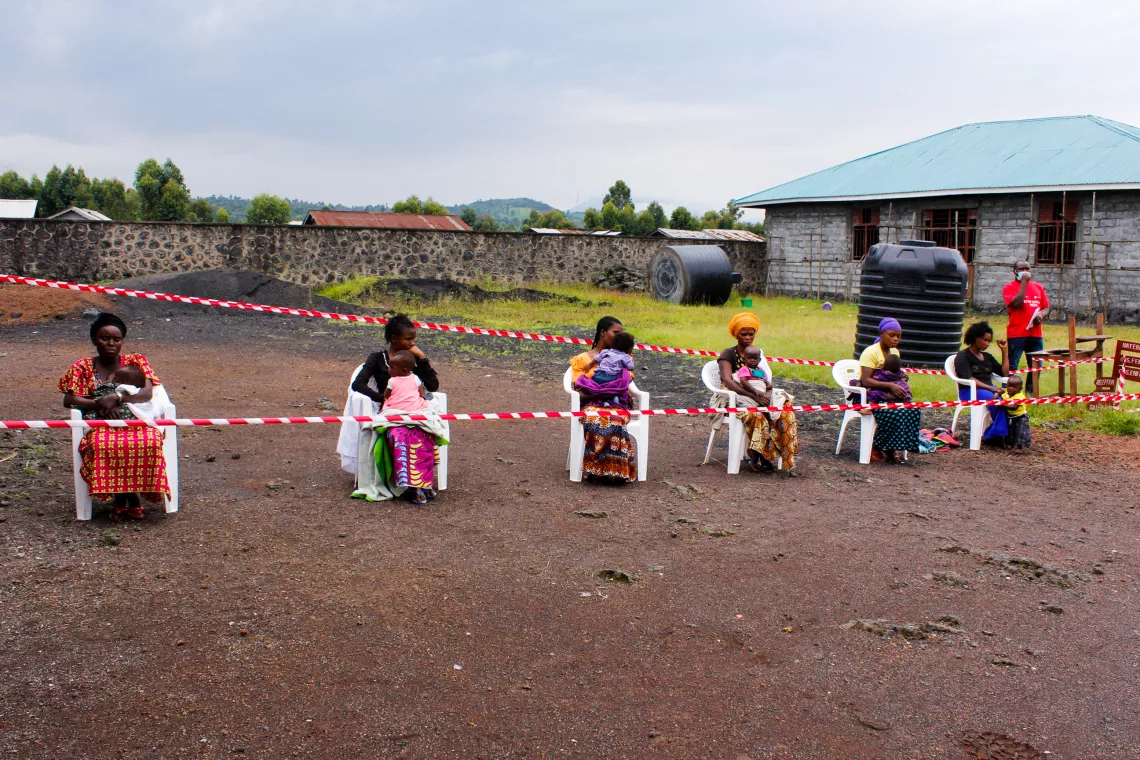 Mothers waiting to have their children vaccinated as part of a UNICEF-supported measles vaccination campaign in Goma, Democratic Republic of the Congo, 21 April 2020. The COVID-19 pandemic continues to test the country's health system, which has also been dealing with Ebola and measles epidemics. The measles vaccination campaign was launched on 21 April 2020, initially targeting 150,491 children aged 6 months to 5 years in the most affected health zones in North Kivu province. 