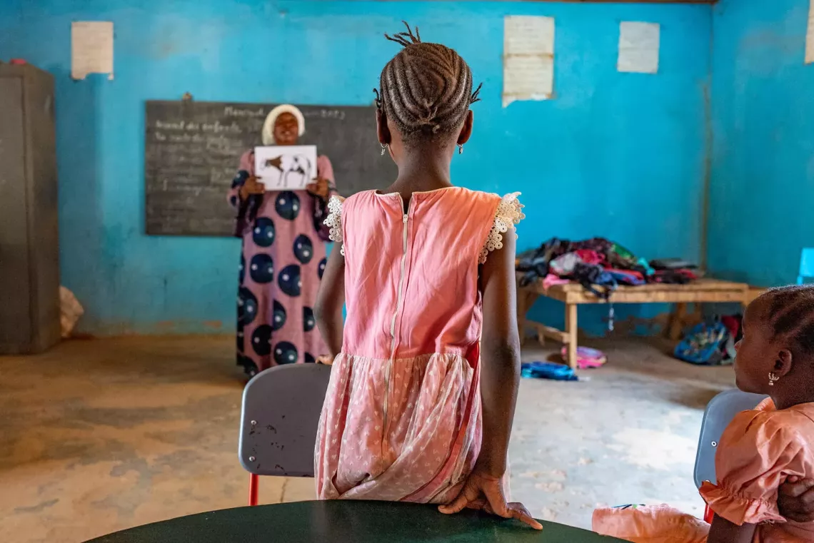 Student faces teacher in a classroom in Mali. 