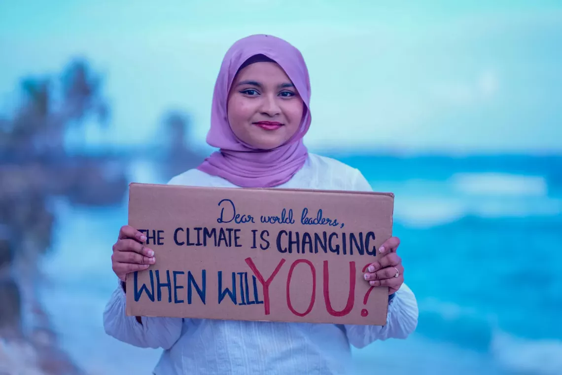 22-year-old Aminath Zara Hilmy stands on an artificial beach in Mal&eacute;.