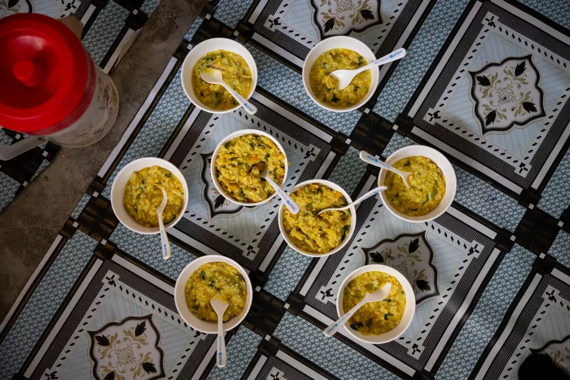 Bangladesh. Bowls of rice, lentils, vegetables and eggs that were prepared during a cooking demonstration are displayed at an integrated nutrition facility.