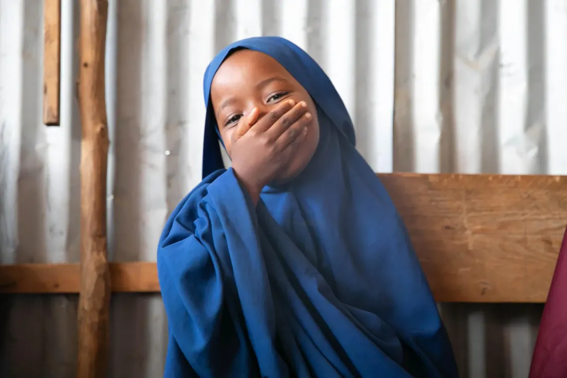 Somalia. Asha smiles in a classroom at a school in Baidoa.