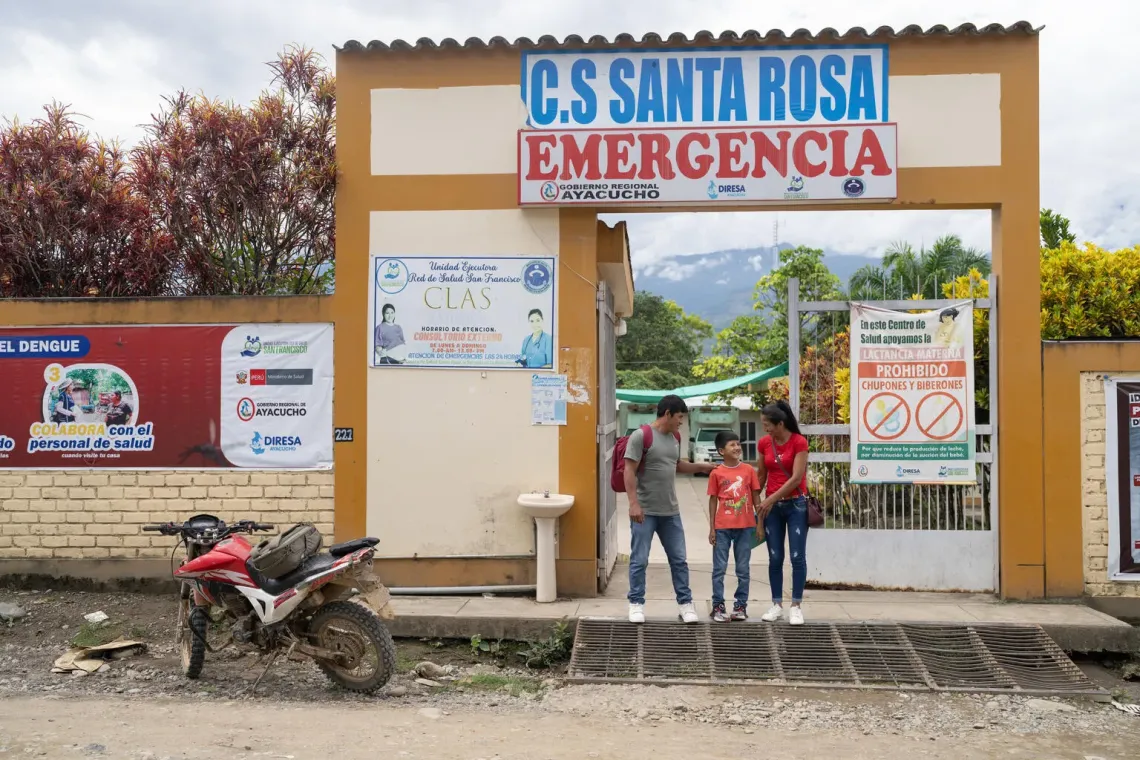 Peru. Hansel leaves a clinic with his parents after a check up.