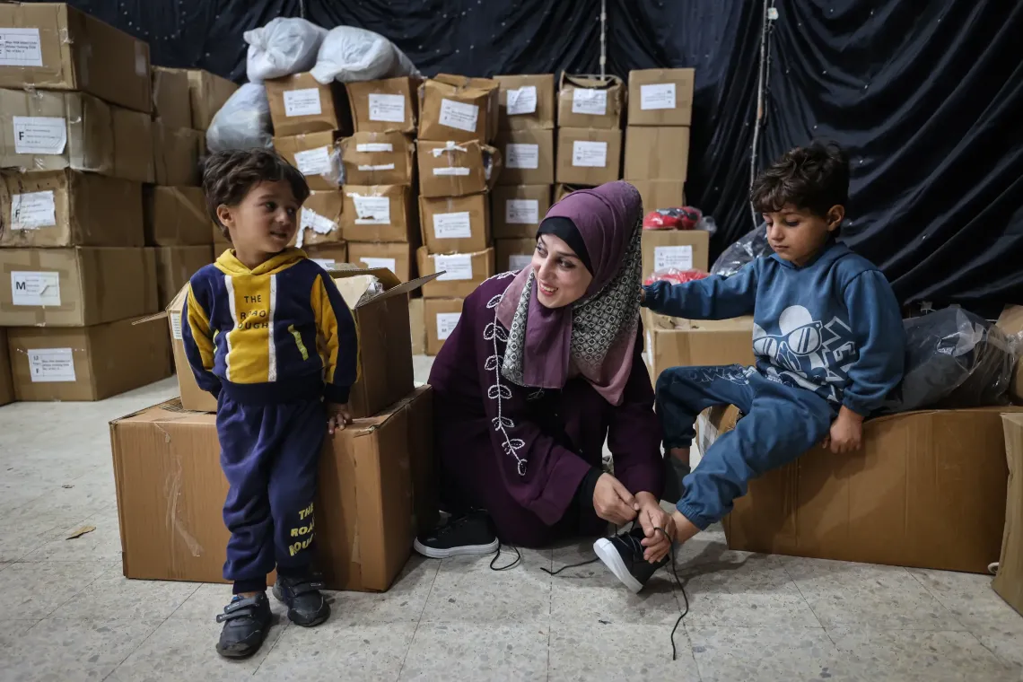 UNICEF provides winter clothing kits to children across the Gaza Strip. Captured here is a distribution of winter clothes for children in Al Zuwayda