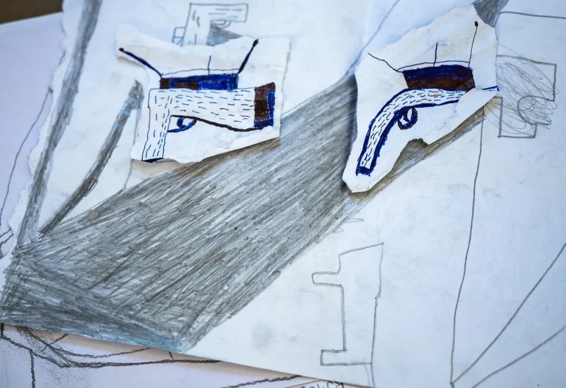 Haiti. A boy&rsquo;s drawings are pictured at a transit centre.
